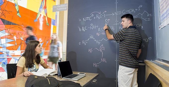 tutoring session in Chevron Hall study area