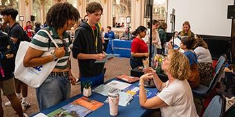 Students get helpful support info at a Pitt resource fair during Provost Academy week