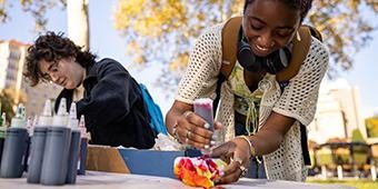 students participating in tie-dye activity.