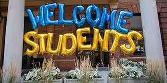 Balloons spelling out Welcome Students outside William Pitt Union.